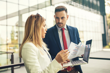 Business people are discussing about project
