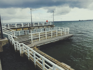 Wooden pier on cloudy day