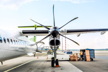 Aircraft engine propeller blades at the airport with clear sky