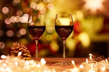 Christmas still life with glasses of red wine