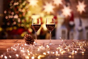 Christmas still life with glasses of red wine