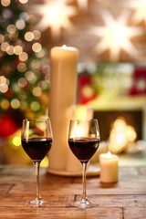 Christmas still life with glasses of red wine