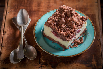 Closeup of delicious cheesecake served in blue porcelain