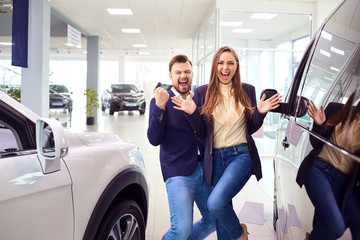 Car buyers are happy to buy a car in the auto salon