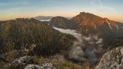 Misty sunrise in the canyon, mountain sunrise landscape in Poland, time lapse