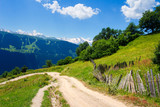 Georgian nature landscape. Summer mountain landscape in Svaneti with road to village