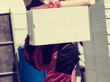 Woman working with airbricks