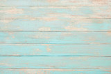 Vintage beach wood background - Old weathered wooden plank painted in turquoise blue pastel color.