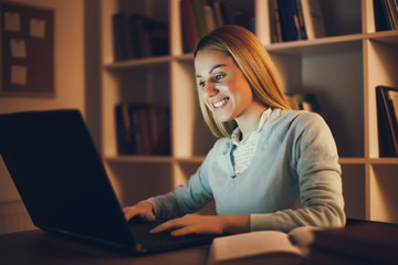 Student learning at home. Watching online course.