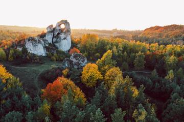 A panoramic view of the unique Okiennik rock in Poland with a large natural window