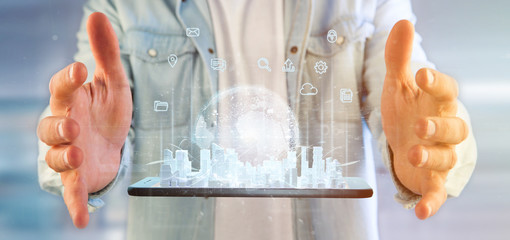 Businessman holding Smart city user interface with icon, stats and data 3d rendering