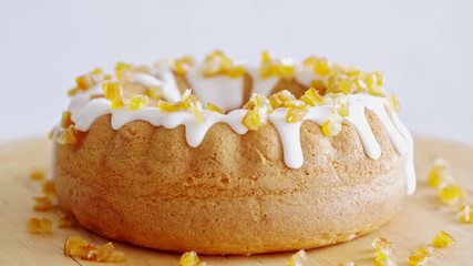 Close up of easter cake with icing and candied fruit  