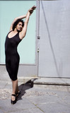 Dancer with black leotard and ballet tips