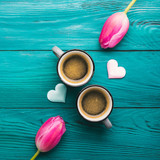 Two coffee cups, hearts and flowers. Valentine day