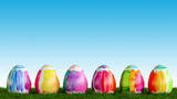 Painted easter eggs are looking on meadow for easter