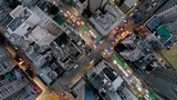 Temple Street Market, Hong Kong, Birds eye view in city centre of Kowloon, Urban landscape view at night footage, Aerial view from the top, Drone China