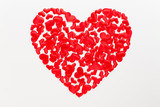 Valentines day background red hearts on white wooden background.