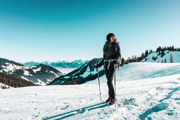 Woman snow hiking in winter