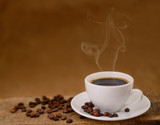 Coffee cup and coffee beans.