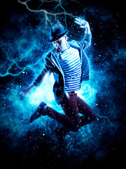 Man break dancing on electricity light background