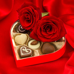 red roses and delicious chocolate pralines