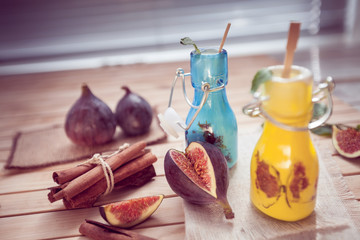 the yogurt with a fig in glass jars and cinnamon