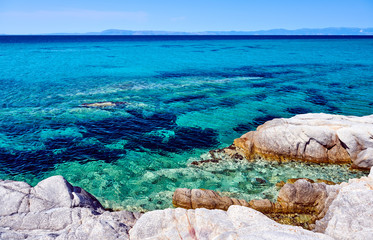 Rocky coast and turquoise sea in Greece