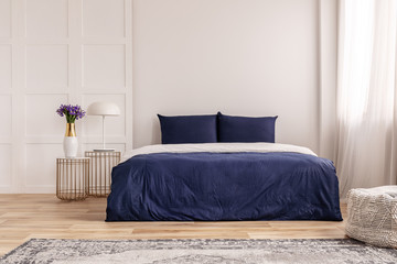 Simple navy blue and white bedroom interior design