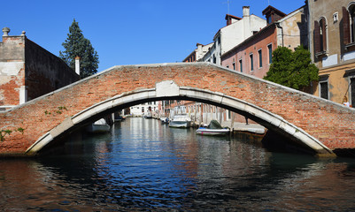 Canal and Bridge in the Dorsodouro region of Venice. Italy.