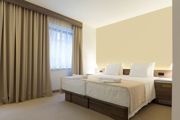Interior of a modern new hotel bedroom