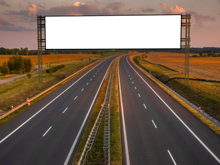 Blank white billboard over the highway