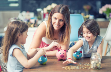 Happy Family mom daughter save money piggy bank future investment savings