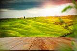 Desk of free space for your decoration and spring landscape of tuscany