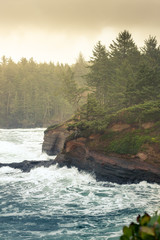 Travel west coast explore Rock cliff Ocean waves Pacific ocean sunrise Adventure