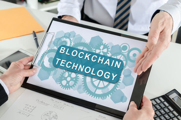 Blockchain technology concept on a clipboard