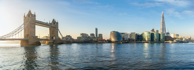 The iconic urban skyline of London, UK, during a sunny morning: from the Tower Bridge to London Bridge