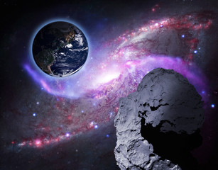 asteroid comet or meteor coming to the earth.  elements of this images furnished by nasa