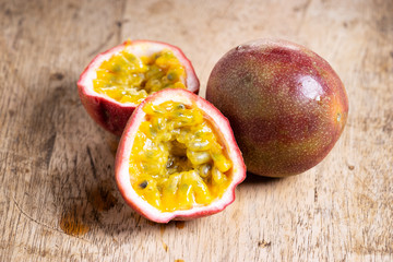 Ripe passion fruit on wooden background