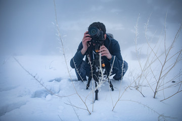 photographer hand camera in winter