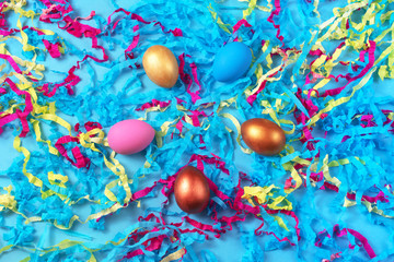 Easter set of colored eggs on bright blue background Easter holiday decorations