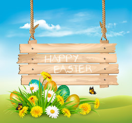 Easter Holiday Background with colofrul eggs in green grass and wooden sign. Vector.