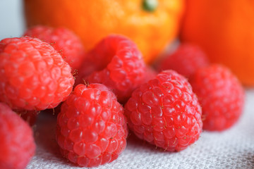 Raspberries with oranges