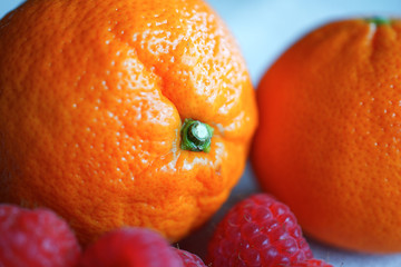 Raspberries with oranges