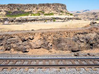 Railroad tracks running along the canyon wall in Columbia Hills State Park - WA, USA