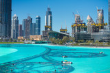 The Dubai fountain lake in the day