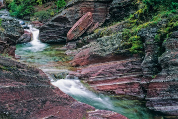 Red Rock Creek flows through Red Rock Canyon in Waterton National Park, Canada