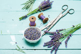 lavender bouquet arrangement, flower cutting with old scissors on blue wooden