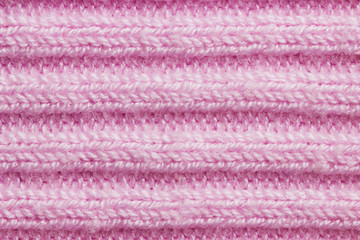 Pink knit background with patterns