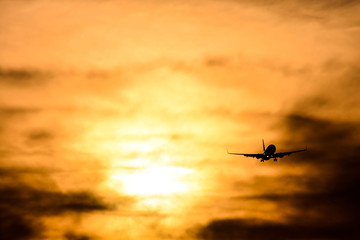 Silhouette airplane flying