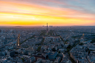 Aerial view of Paris and Eiffel tower at sunset in Paris, France.